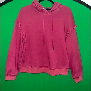 A pink Cynthia Rowley hooded sweatshirt in the size medium.